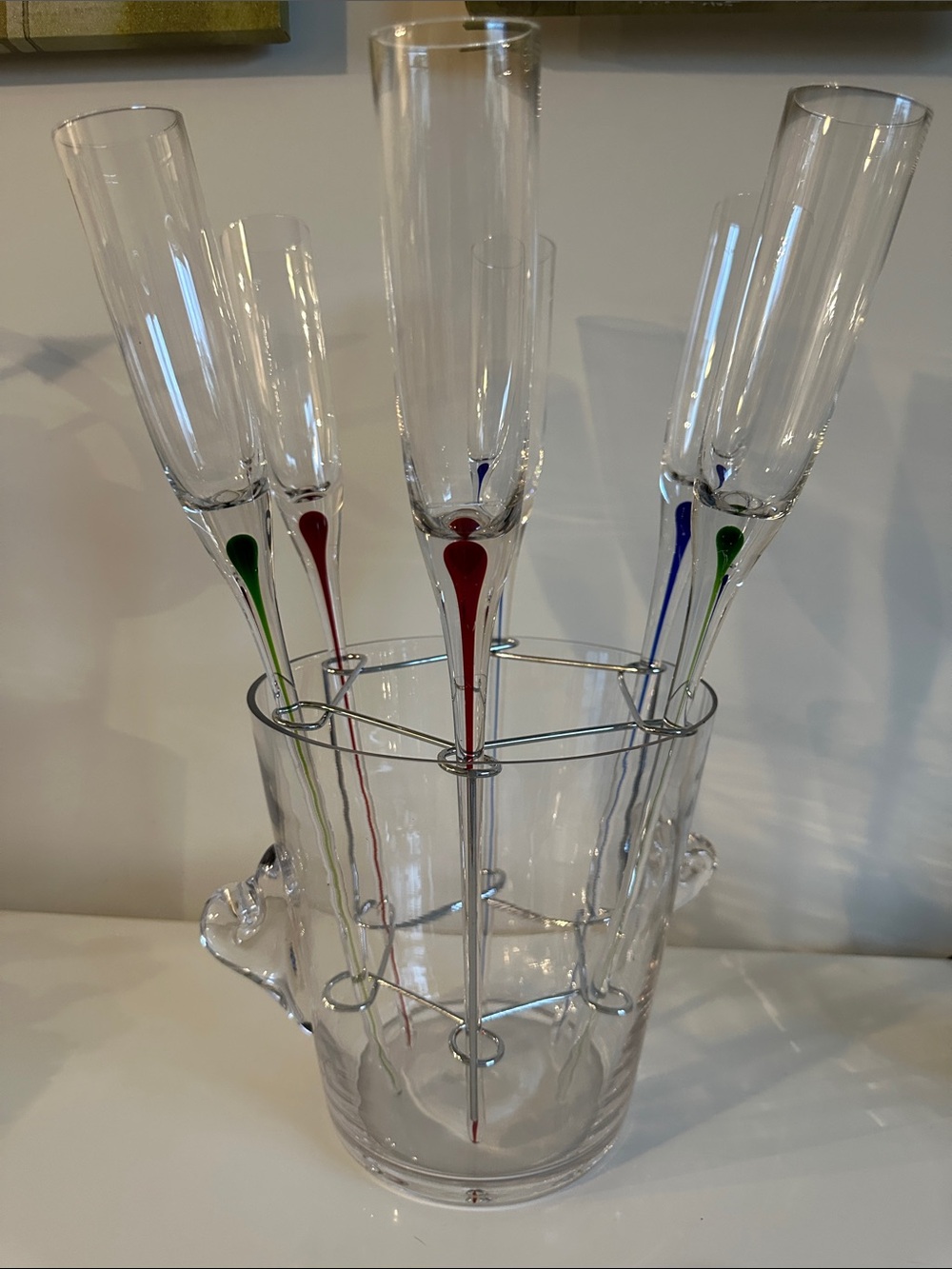 Set of Six glass Clear Champagne Flutes with Red, Green & Blue Stem Accents